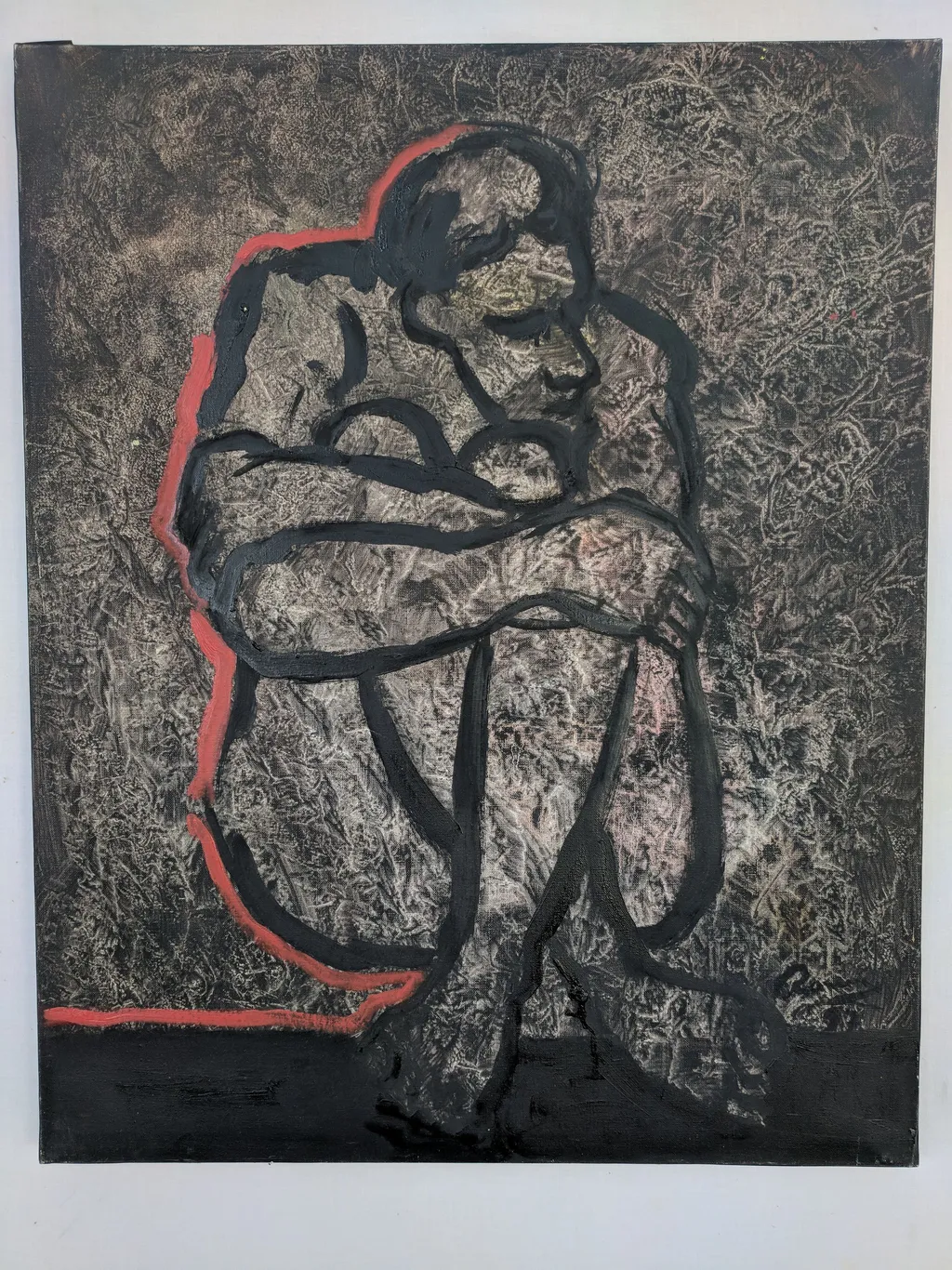 Nu accroupi avec contour rouge